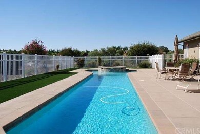 Private fenced pool area with views of the valley.