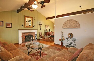 Living Room - Beautifully finished hardwood floor.