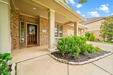 A welcoming front entrance with a covered porch...