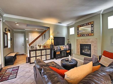 Family room centers around a cozy fireplace with r