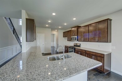 Amazing kitchen with tons of cabinets and counter space.  Butlers pantry to dining room.  You will love preparing meals in this kitchen.