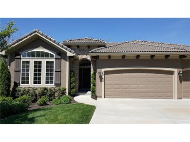 Stucco surround and Tile Roof professionally lands
