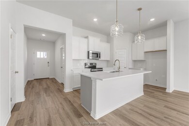 Front entry and kitchen