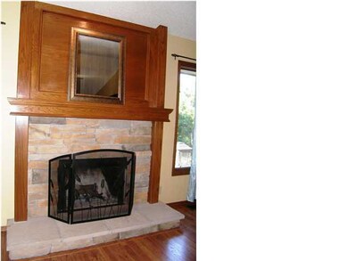 A closeup of the fireplace in the living room...no