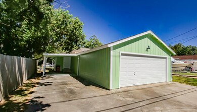 Approaching carport and garage from the back alley