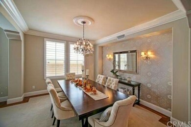 Gracious Dining Room Features Crown Molding, Elega