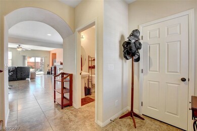 Entryway coat closet and powder bath.