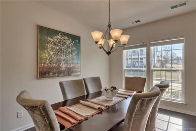 Formal dining room has plenty of natural light