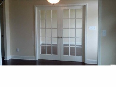 The Study features French doors and hardwood.
