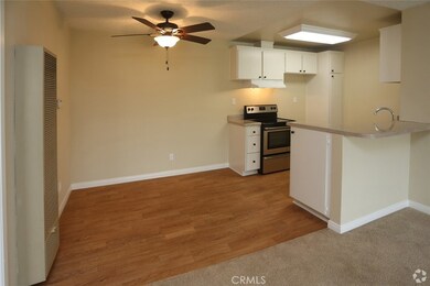 Dining and kitchen (not actual unit)