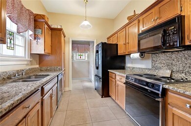 The beautiful granite countertops accent your brig