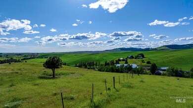 View of mountain background with rural landscape and agricultural land