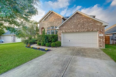 Nice and wide double driveway gives you plenty of parking along with the 2 car attached garage.
