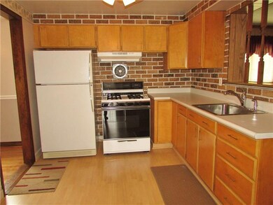 KITCHEN WITH REFACED CABINETS  APPLIANCES STAY WIT