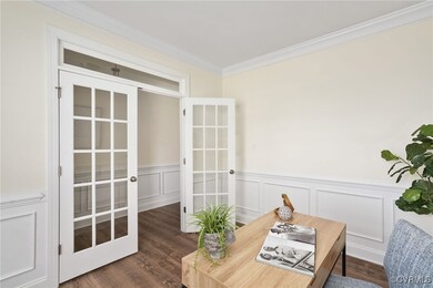 A private home office featuring glass French doors