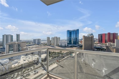 Balcony featuring a view of city
