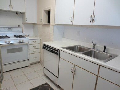 Kitchen has ceramic tile and all appliances stay!