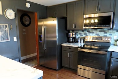 Another angle of the kitchen space and stainless s
