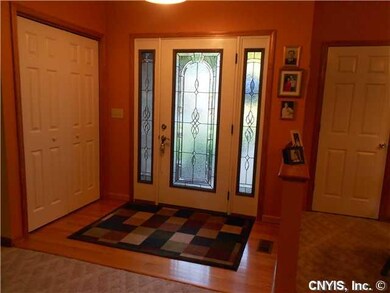 Foyer. Hardwoods lead to an open floor plan.