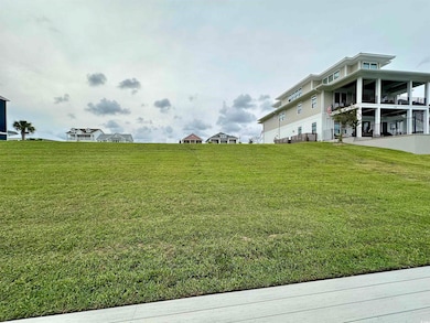 View of yard featuring a balcony