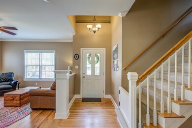 Lovely foyer is bright and airy.