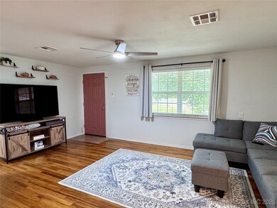 Beautiful view out to the circle drive and mature trees in the front yard.