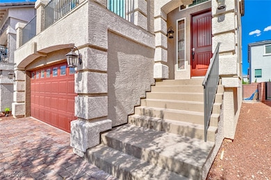 Property entrance with an attached garage