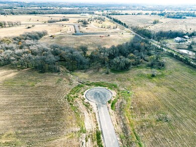 Aerial overview of property's location with rural landscape
