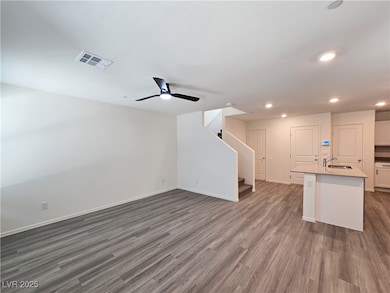 Unfurnished living room with recessed lighting, da
