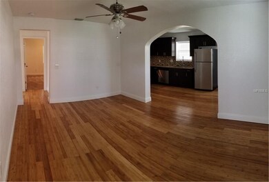 Living Room view #2 looking at Kitchen and Hallway