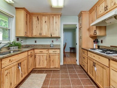 Custom hickory cabinetry and granite in the kitche