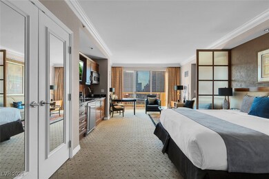 Bedroom featuring french doors, ornamental molding