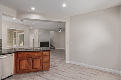 Kitchen with light wood-style flooring, a ceiling