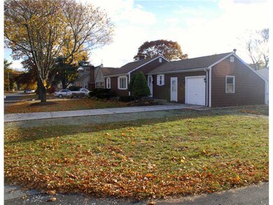 Exterior Front. Corner lot, generous driveway and