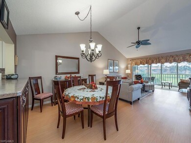 Dining area featuring ceiling fan with notable cha