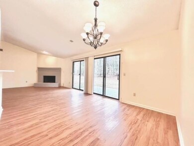 Unfurnished living room featuring a fireplace with