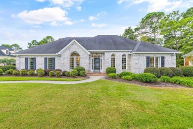 Ranch-style house featuring a front yard