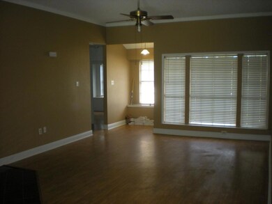 Living room with corner fireplace (shown in the ne