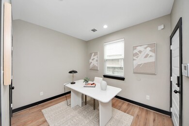The first floor bedroom can be used as a home offi
