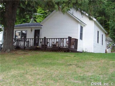 Exterior Front. Nice front deck. Notice the AC uni