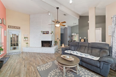 Spacious family room with a door leading to backya