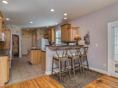 14'11 x 12'6 Kitchen with Breakfast Bar