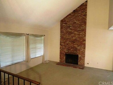 View of the step down living room from entry with 