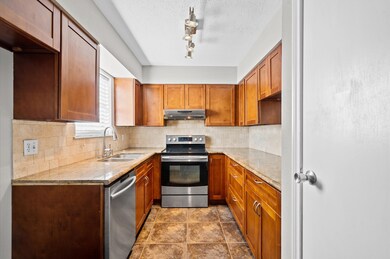 This modern kitchen exudes warmth and sophisticati