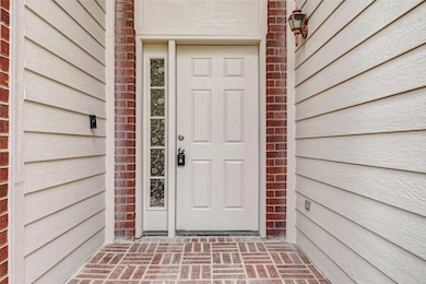 Step into comfort & charm with this inviting front