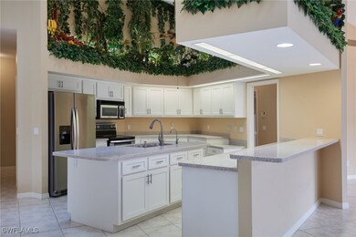 Kitchen featuring appliances with stainless steel