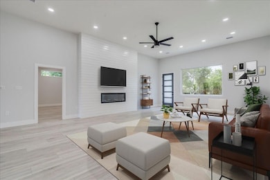 Living room featuring recessed lighting, ceiling 