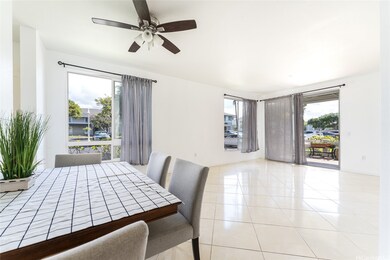 Large living area with 9 ft ceilings giving it an