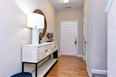 FOYER WITH HARDWOOD FLOORS