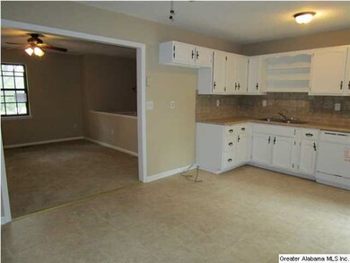 ANOTHER VIEW OF KITCHEN TO LIVING ROOM